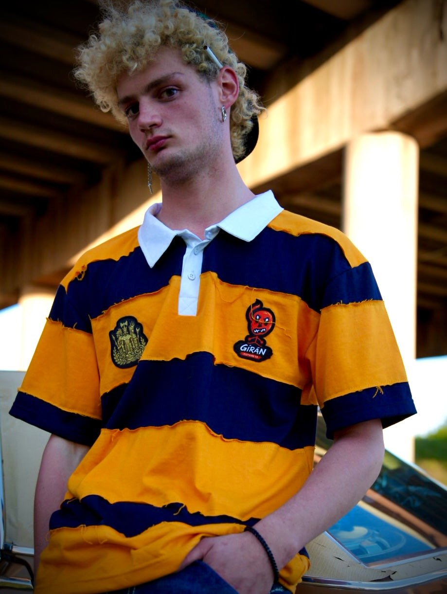 GÍRÁN Shortsleeved “Golden Rebellion” Distressed Rugby Polo