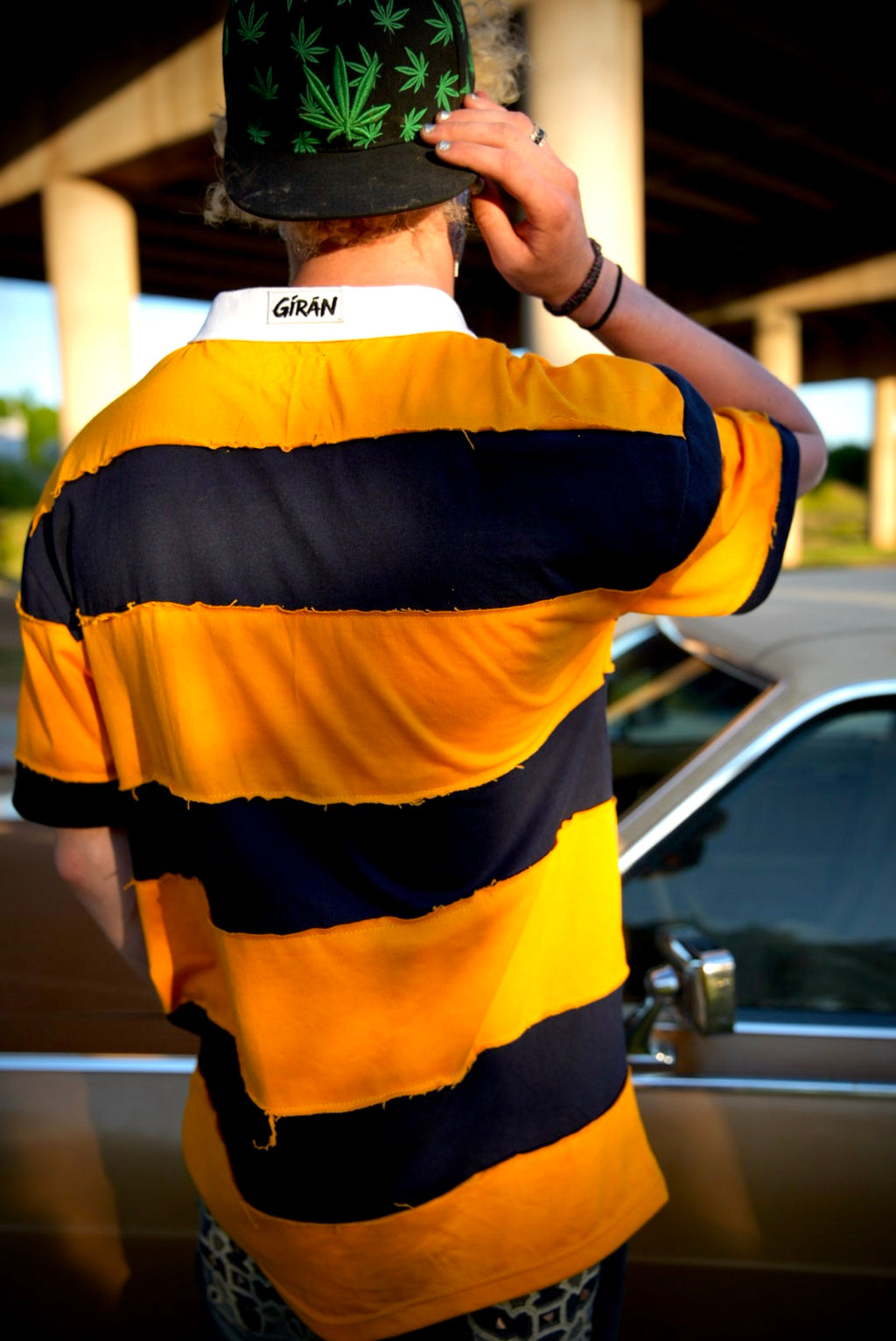 GÍRÁN Shortsleeved “Golden Rebellion” Distressed Rugby Polo